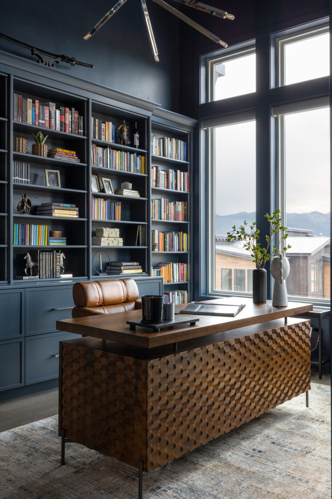 Example of a transitional home office design in Salt Lake City