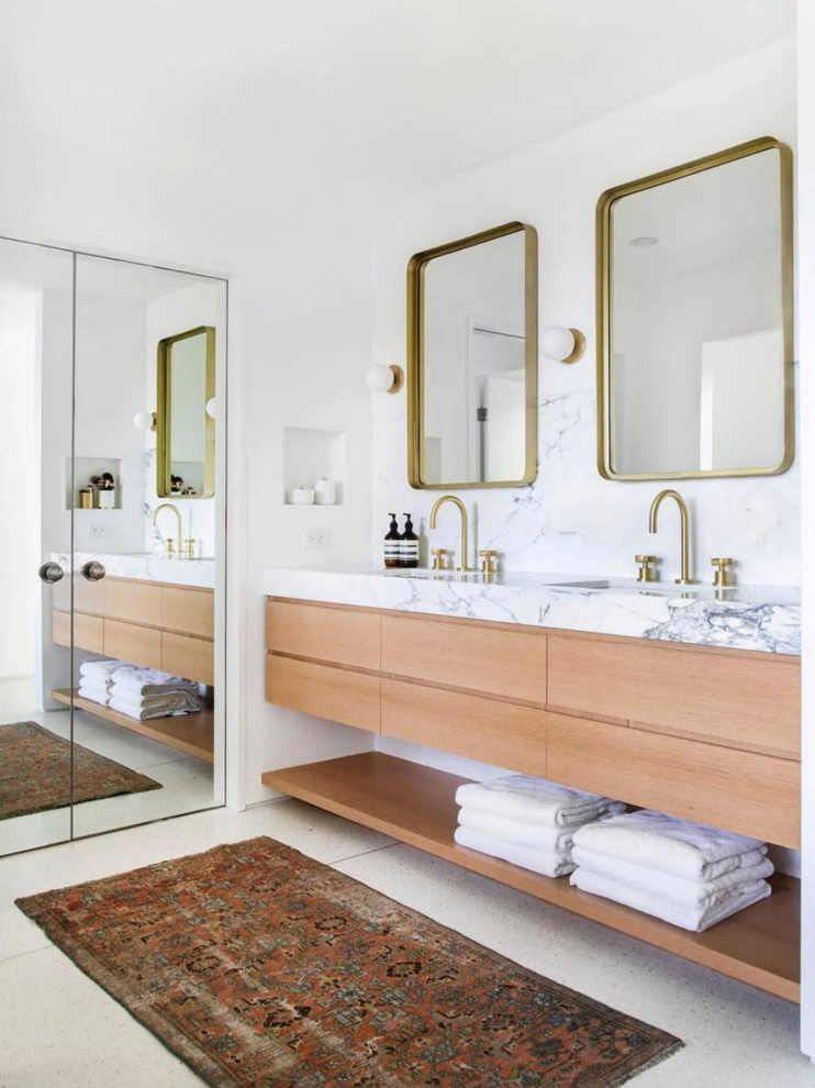 Photo of a contemporary bathroom in Cleveland with flat-panel cabinets, medium wood cabinets, white tile, white walls, an undermount sink, white floor, white benchtops, a double vanity and a floating vanity.