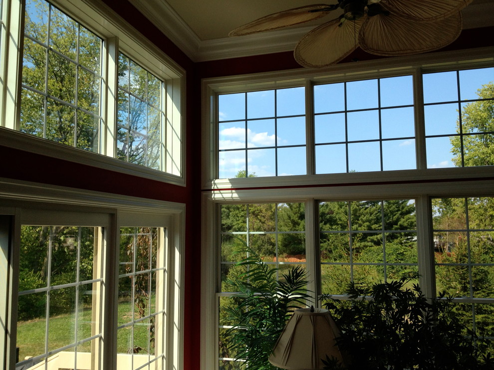 This is an example of a transitional sunroom in Columbus with a standard ceiling.