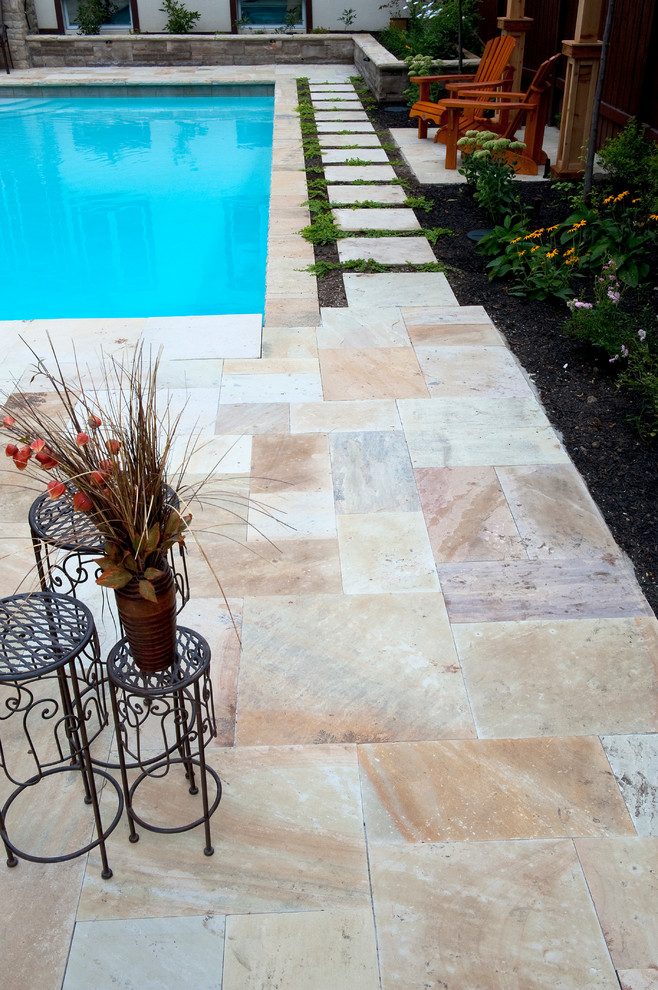 Pool fountain - large transitional backyard stone and rectangular pool fountain idea in Toronto