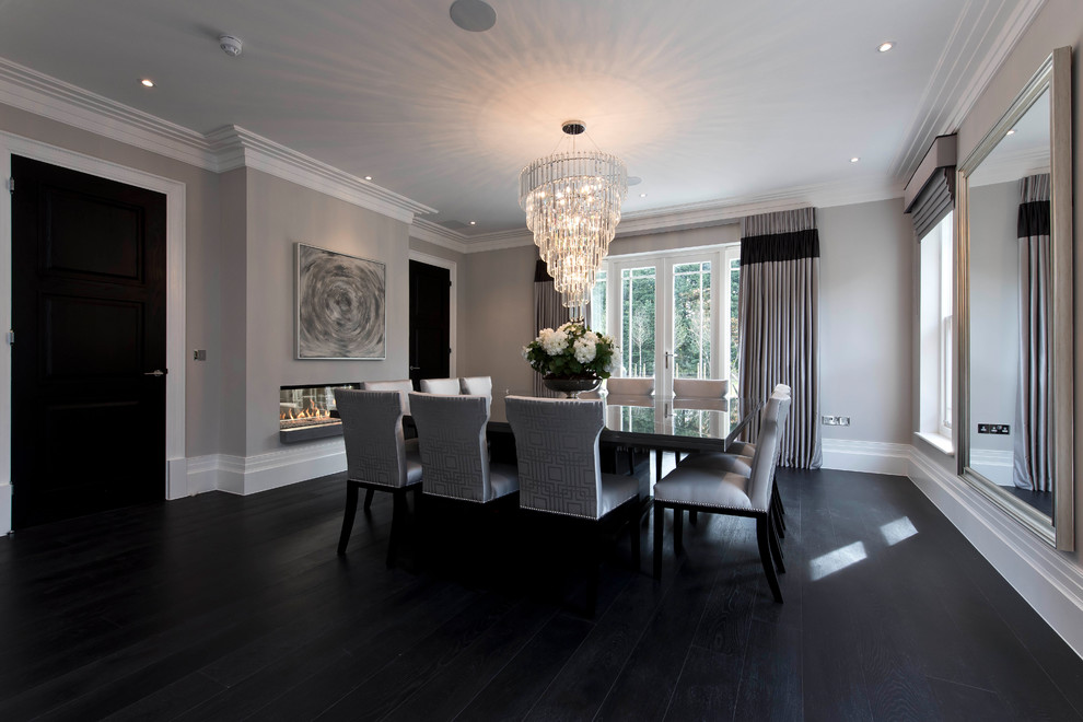 Photo of a traditional dining room in Surrey.