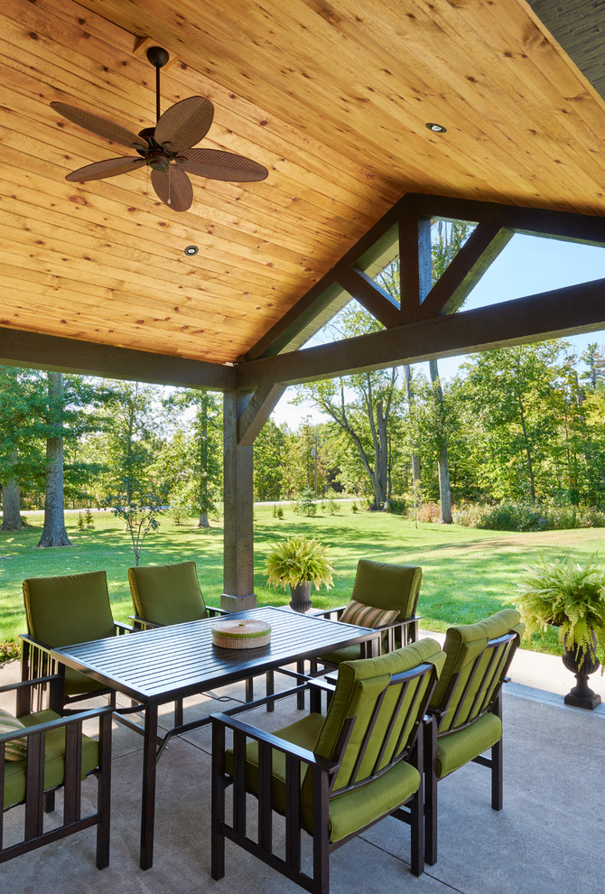 Deck - rustic side yard deck idea in Toronto with a roof extension