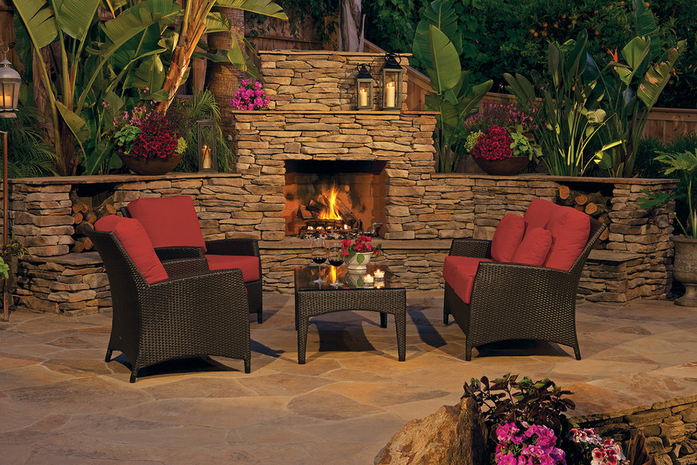 Design ideas for a contemporary patio in Toronto with a fire feature.