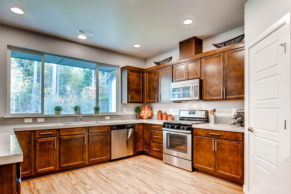 Example of a transitional kitchen design in Seattle