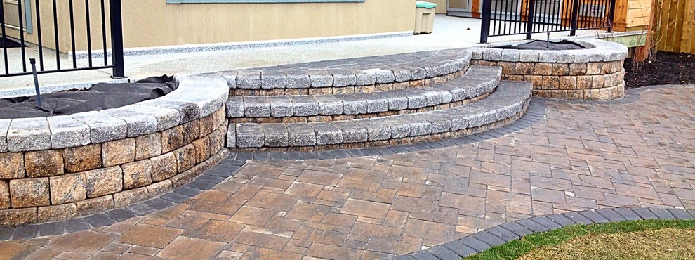 Photo of a transitional landscaping in Calgary.