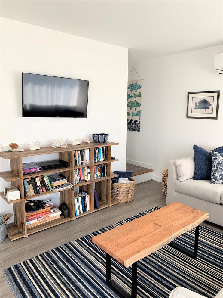 Photo of a beach style living room in Boston.