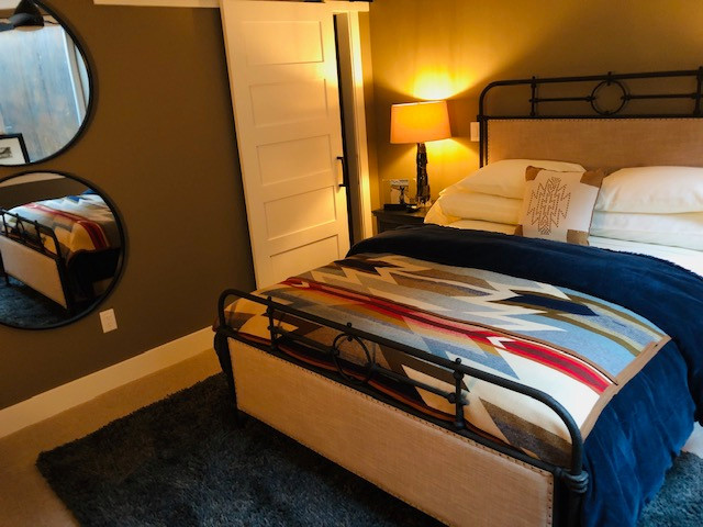 Example of a transitional home design design in Denver