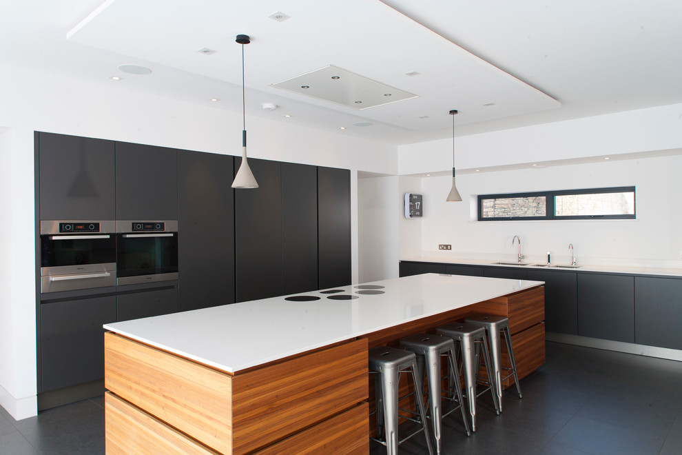 This is an example of a contemporary kitchen in Devon.