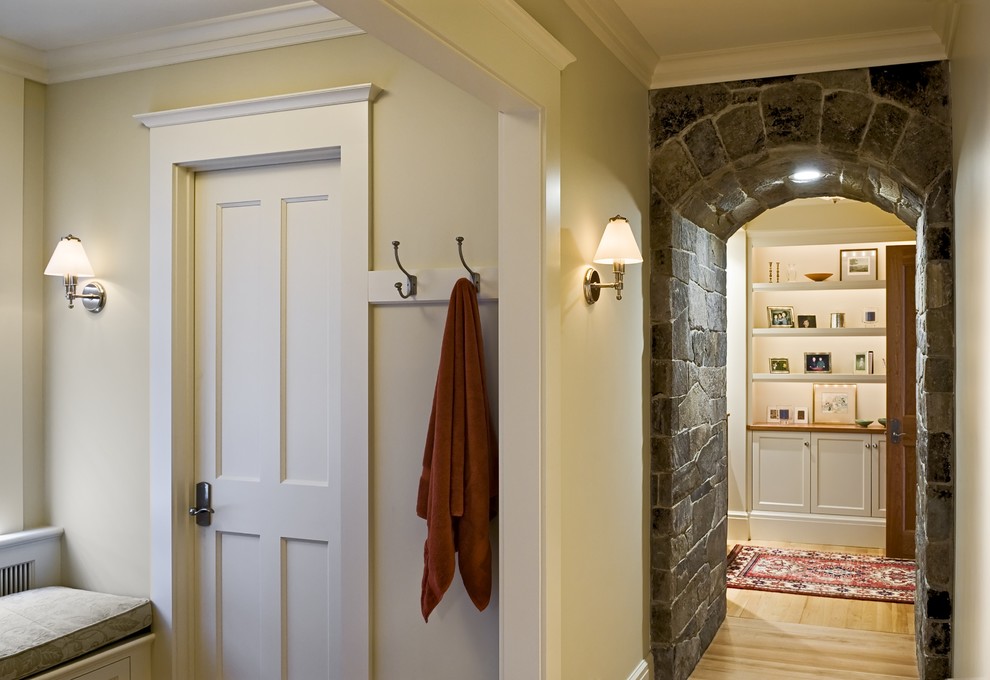 Traditional hallway in Burlington with beige walls, medium hardwood floors and beige floor.