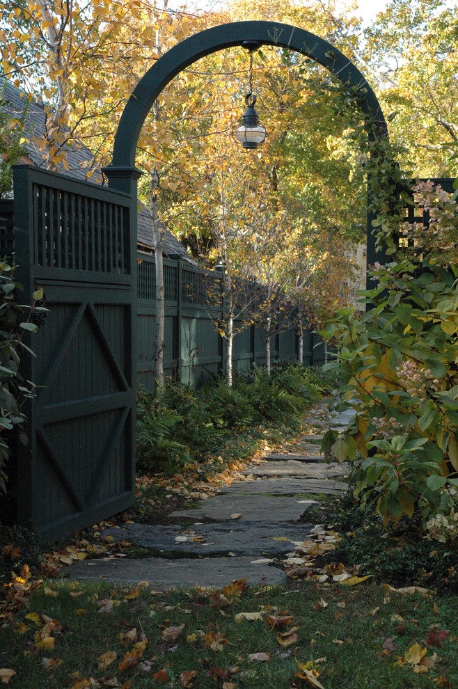 This is an example of a traditional vinyl fence landscaping in Boston.