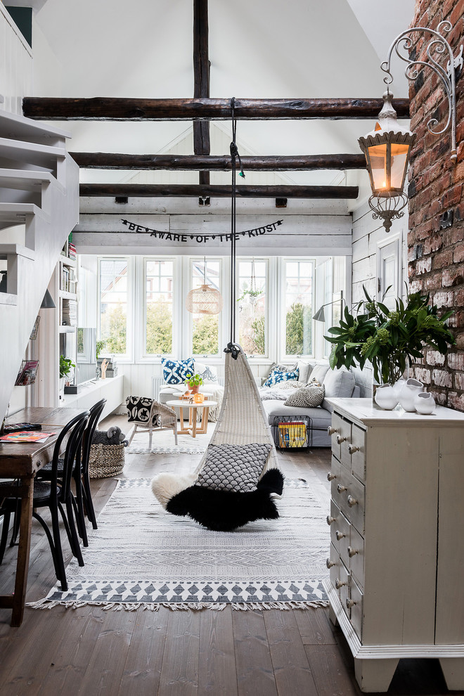 This is an example of an eclectic family room in Gothenburg.