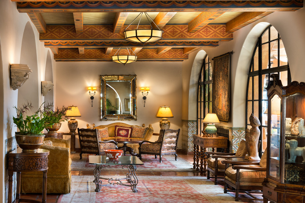 Design ideas for a mediterranean formal living room in Santa Barbara with beige walls.
