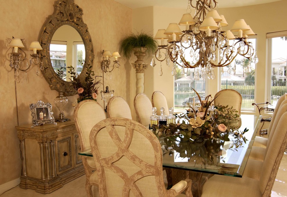 This is an example of a traditional dining room in Orange County with beige walls and beige floor.