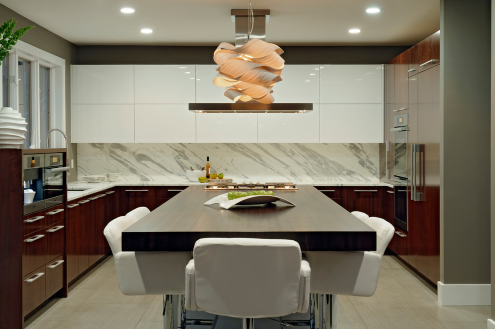 Inspiration for a large contemporary u-shaped eat-in kitchen in DC Metro with an undermount sink, flat-panel cabinets, dark wood cabinets, marble benchtops, with island, white splashback, stone tile splashback, stainless steel appliances and linoleum floors.