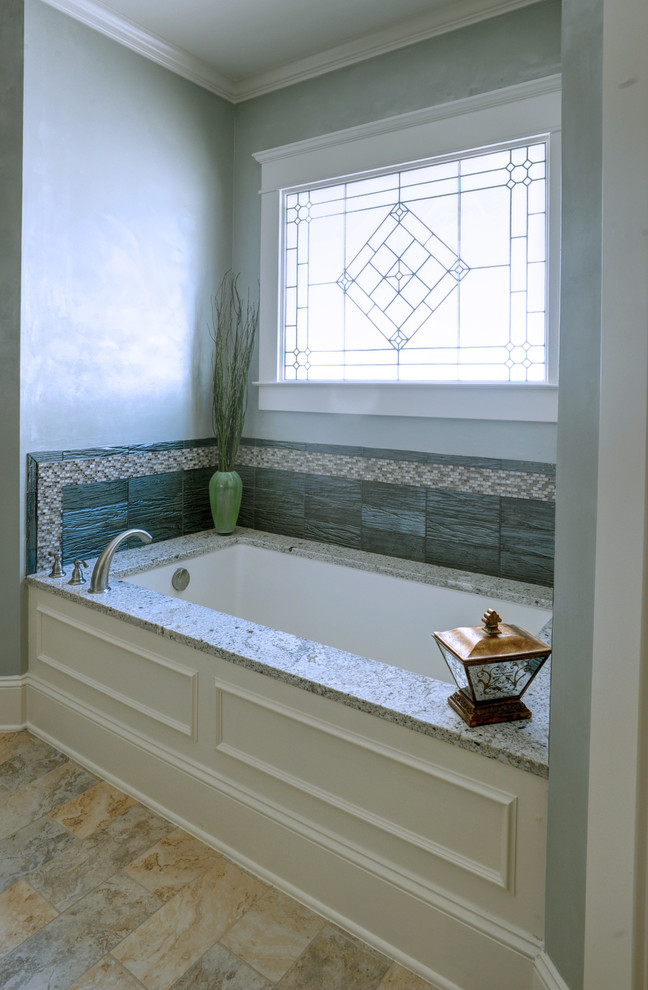 Inspiration for a large transitional master alcove bathtub remodel