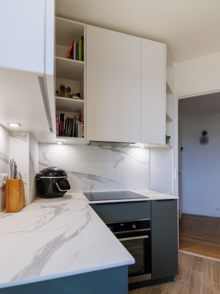 Inspiration for a medium sized modern kitchen in Paris with marble worktops, white splashback, marble splashback, light hardwood flooring, brown floors and white worktops.