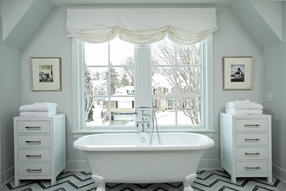 Inspiration for a transitional bathroom in Minneapolis with a claw-foot tub.