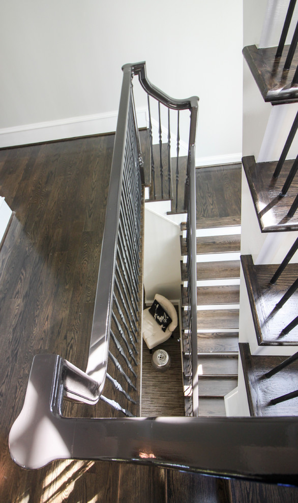 Example of a large transitional wooden l-shaped mixed material railing staircase design in DC Metro with painted risers