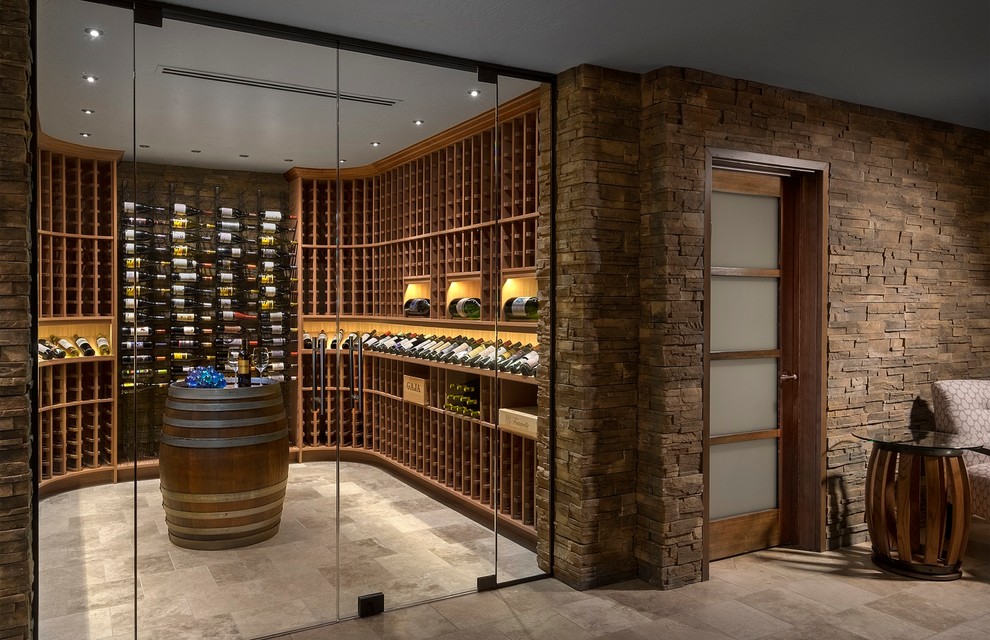 Photo of a contemporary wine cellar in Phoenix with beige floor.
