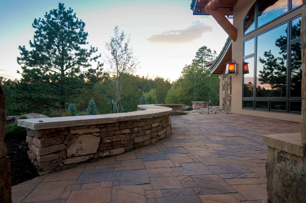 Inspiration for a rustic patio remodel in Denver