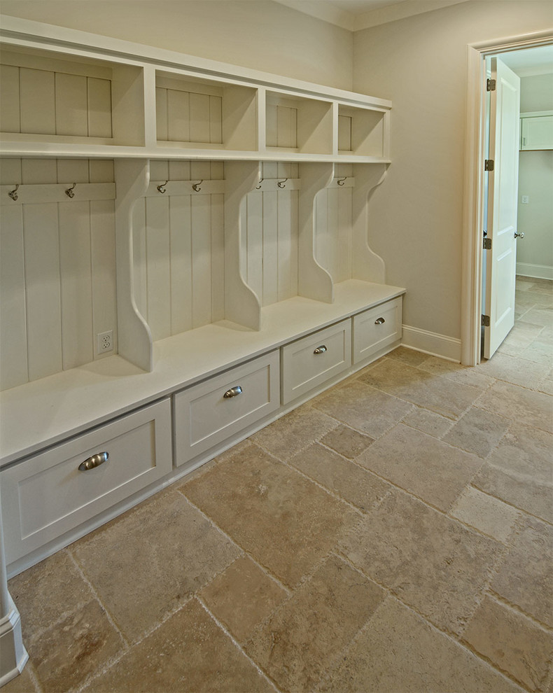 Mudroom - mid-sized transitional limestone floor and beige floor mudroom idea with gray walls