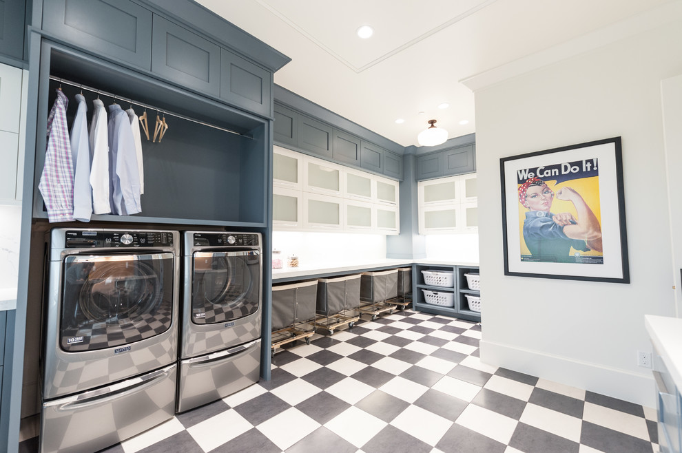 Inspiration for an expansive transitional u-shaped dedicated laundry room in Salt Lake City with a farmhouse sink, shaker cabinets, grey cabinets, marble benchtops, a side-by-side washer and dryer and multi-coloured floor.