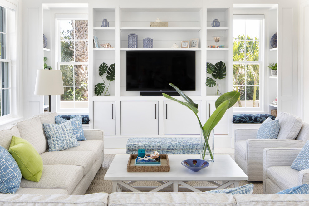 Photo of a beach style family room in Miami.