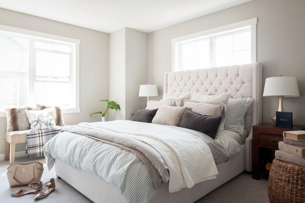 Bedroom - small transitional master carpeted bedroom idea in Calgary with gray walls