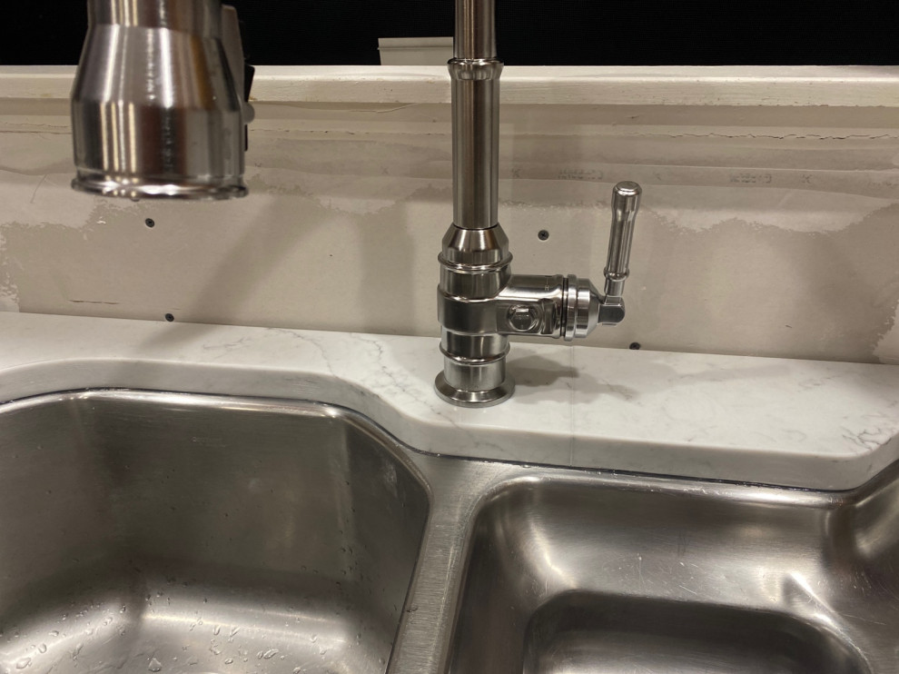 Extra waterproofing in kitchen sink area BEFORE backsplash?