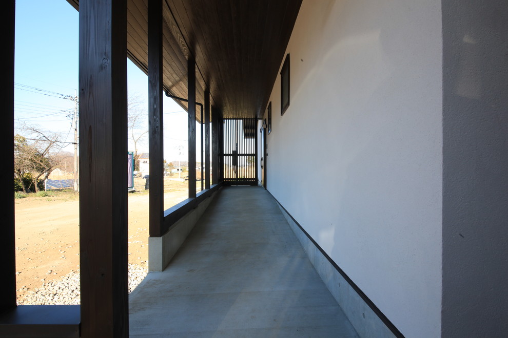 他の地域にあるアジアンスタイルのおしゃれな縁側・ポーチの写真