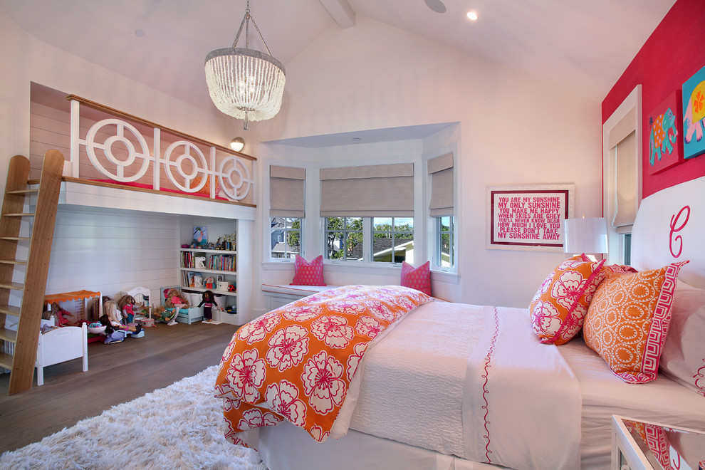 Traditional kids' bedroom in Orange County with white walls and medium hardwood floors for girls.