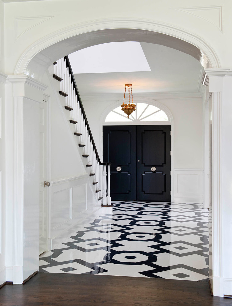 Inspiration for a traditional foyer in Dallas with white walls, a double front door and a black front door.