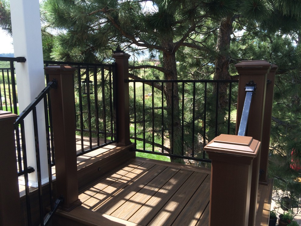 Inspiration for a mid-sized transitional backyard deck remodel in San Diego with a pergola