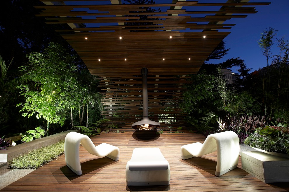 Contemporary patio in Melbourne with a fire feature.