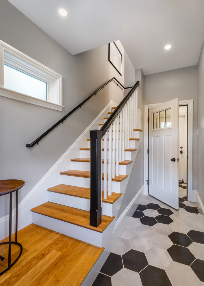 Staircase - mid-sized victorian wooden l-shaped wood railing staircase idea in Boston with painted risers