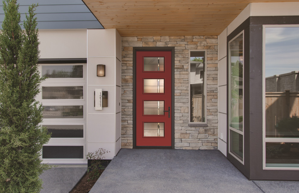 Inspiration for a contemporary front door in Other with a single front door and a red front door.