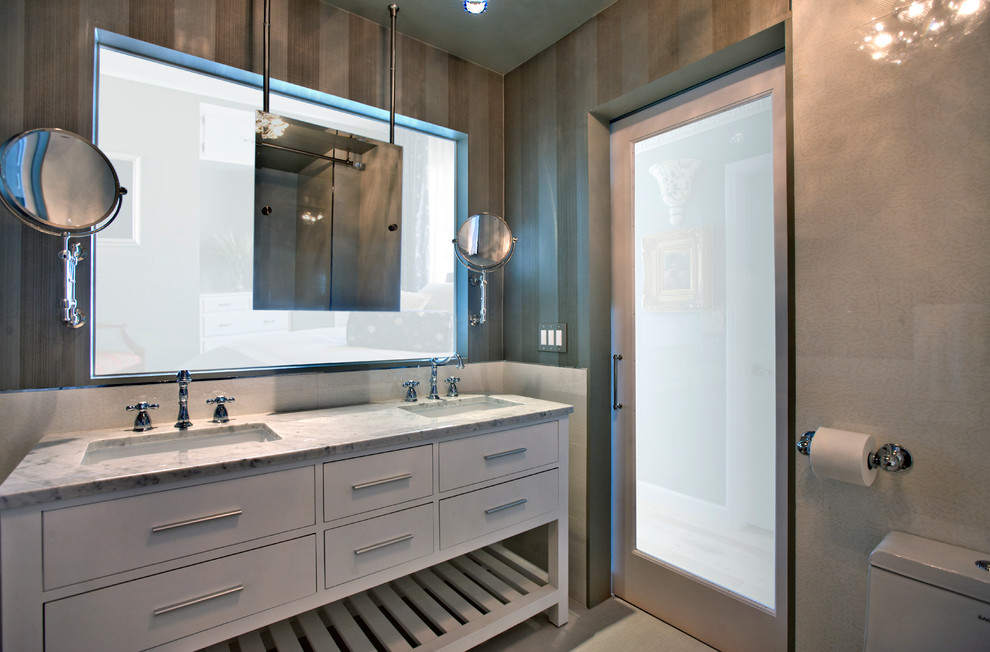 This is an example of a contemporary bathroom in Los Angeles with porcelain tile.
