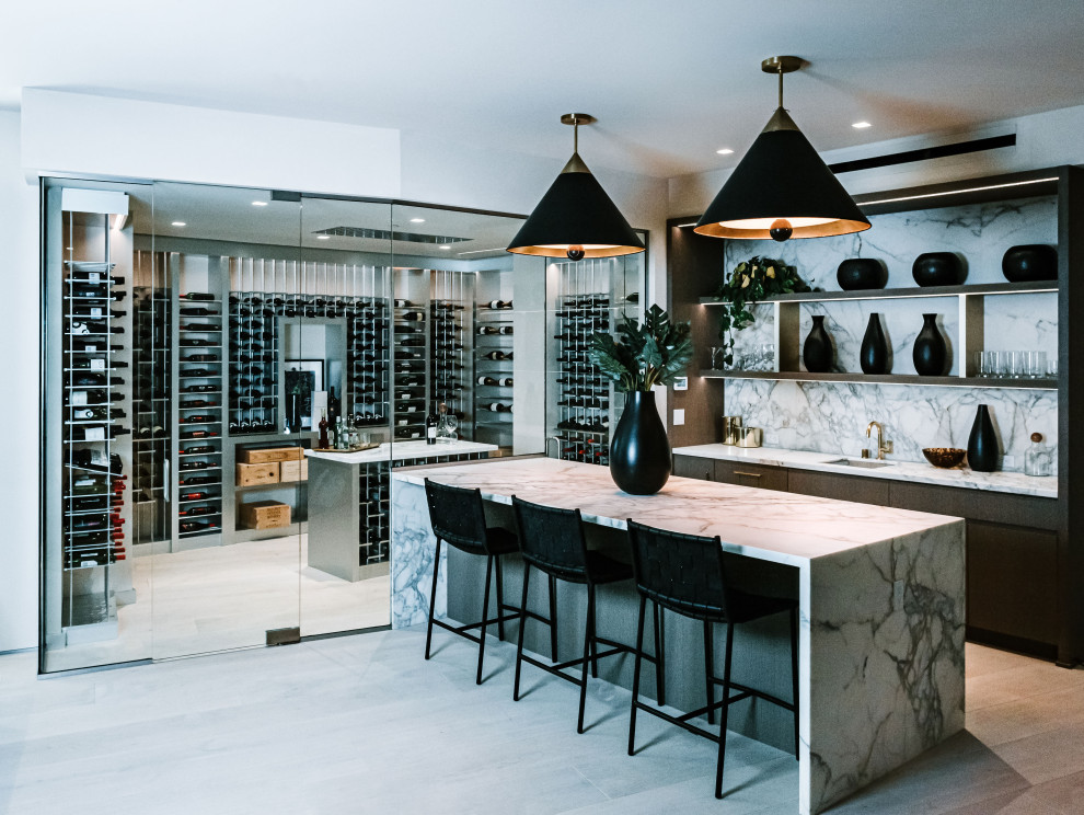 Large contemporary wine cellar in San Diego with storage racks.