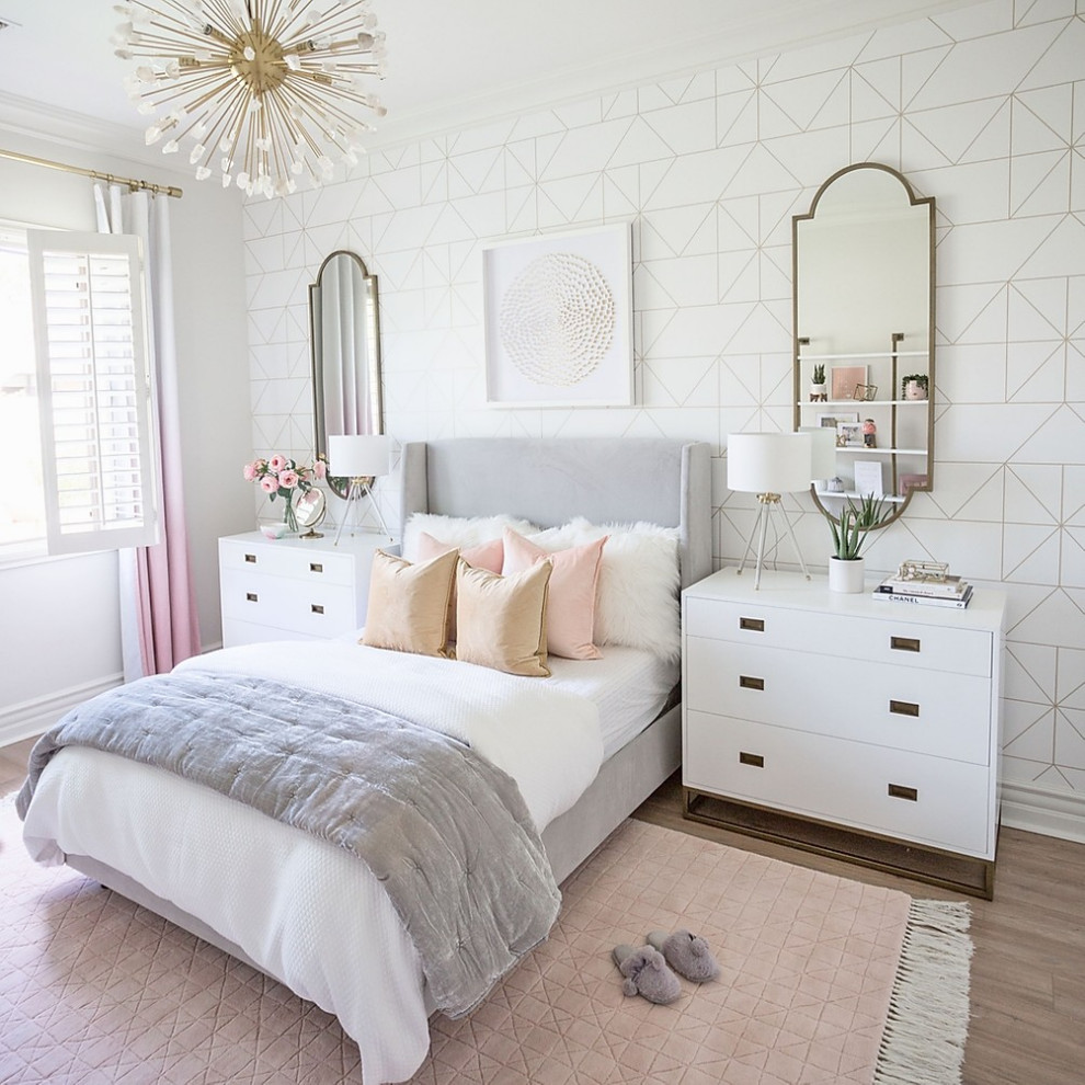 Design ideas for a mid-sized transitional kids' room for girls in Phoenix with white walls, brown floor and wallpaper.