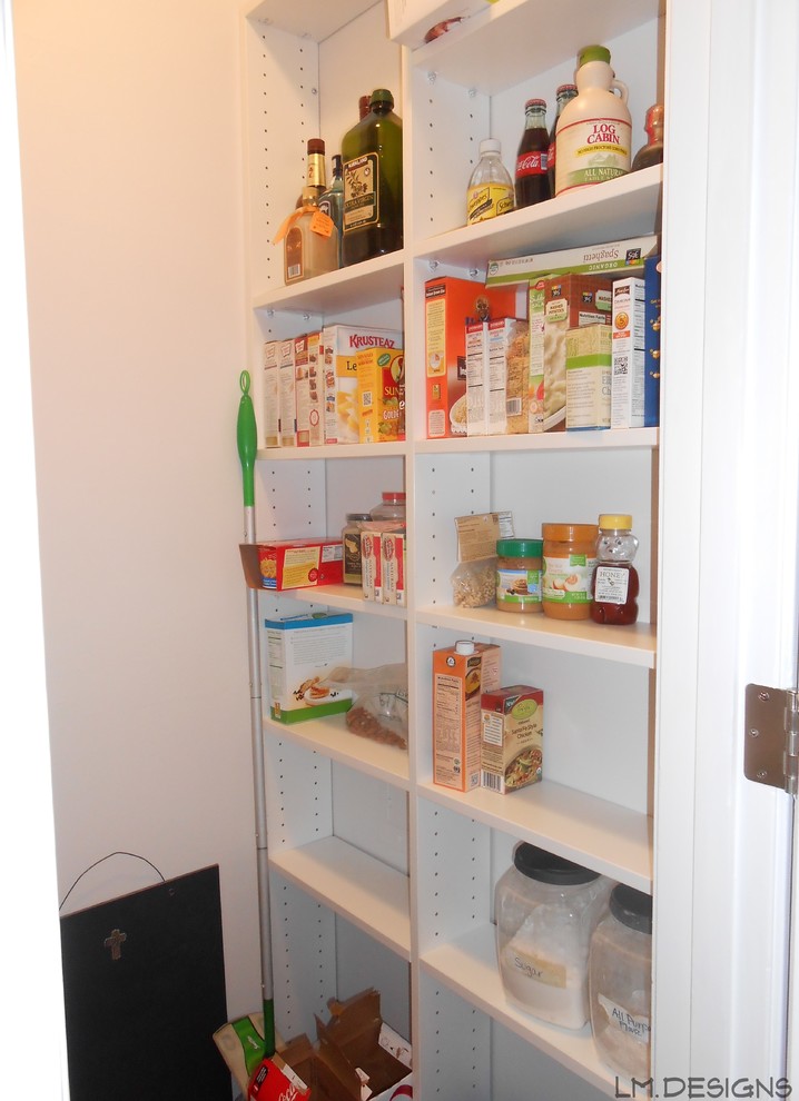 Kitchen pantry - transitional galley kitchen pantry idea with white cabinets