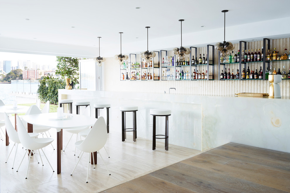 Photo of a contemporary home bar in Sydney.