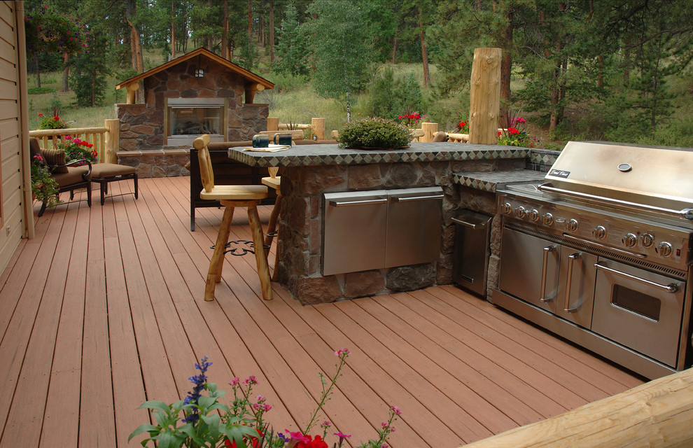Outdoor kitchen deck - mid-sized rustic backyard outdoor kitchen deck idea with no cover