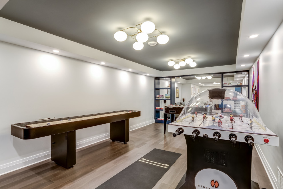 Design ideas for a large basement in Ottawa with a game room, no fireplace, brown floor, coffered and wallpaper.
