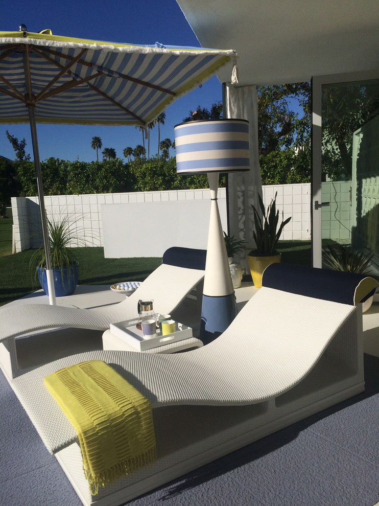 Inspiration for a large modern backyard patio in Las Vegas with concrete slab and no cover.