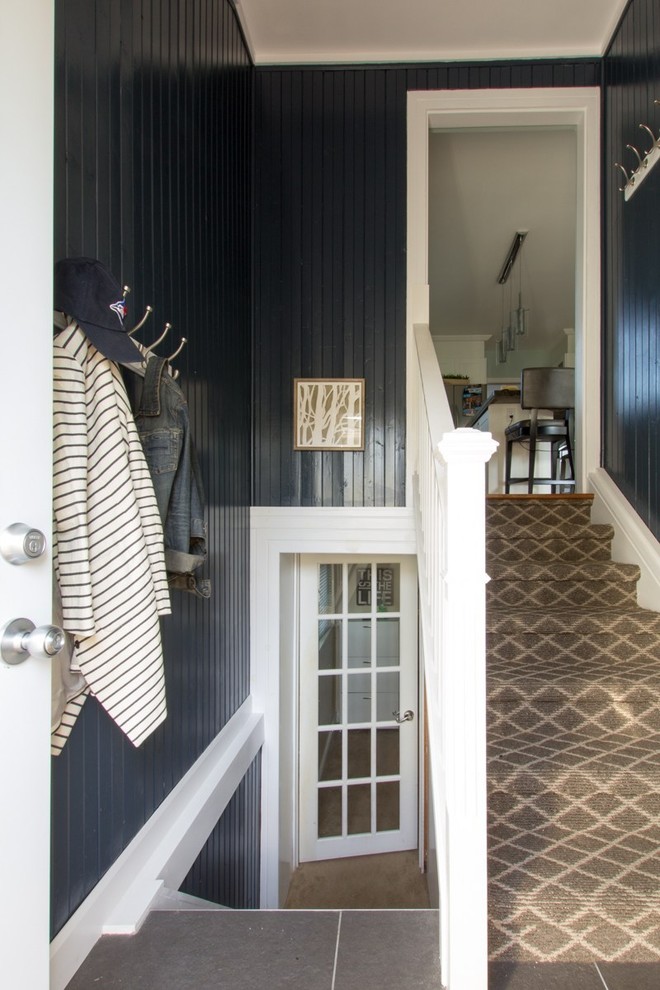 Small transitional slate floor and gray floor mudroom photo in Toronto with blue walls and a white front door