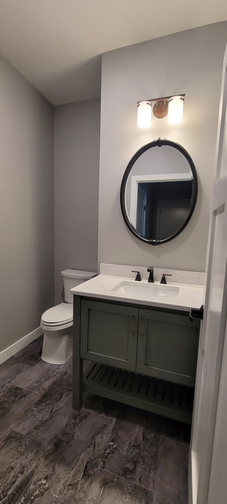Inspiration for a transitional powder room remodel in Cedar Rapids