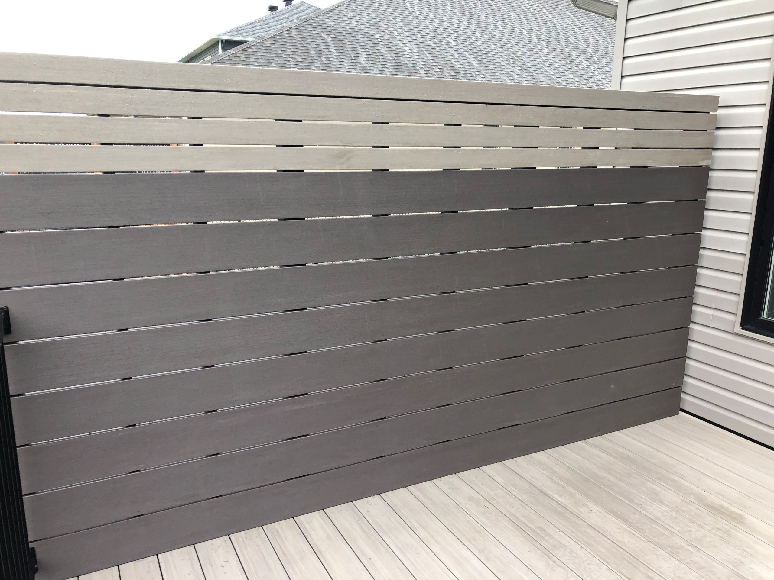 Coastline & Dark Hickory walkout with privacy screen