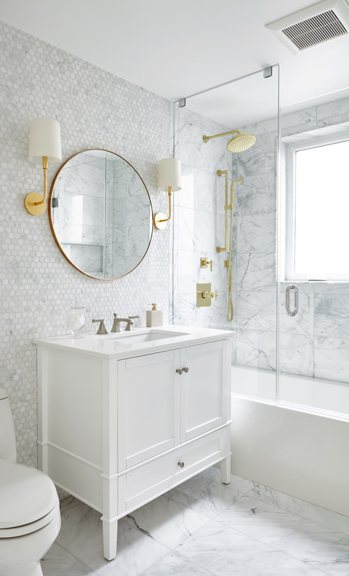 Luxurious Glamour: White Marble Mosaic Backsplash in a Glamorous Bathroom