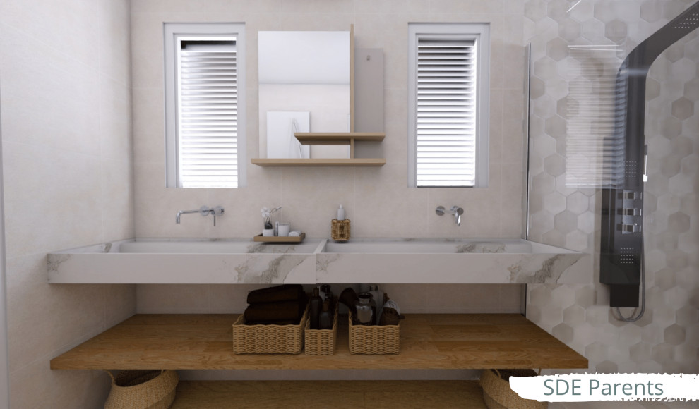 Maritim inredning av ett mellanstort vit vitt badrum med dusch, med öppna hyllor, beige skåp, en kantlös dusch, en vägghängd toalettstol, beige kakel, stenkakel, beige väggar, bambugolv, ett konsol handfat, marmorbänkskiva och beiget golv