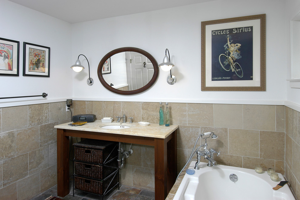 Inspiration for a mid-sized arts and crafts 3/4 bathroom in DC Metro with white walls, limestone floors, grey floor, beige cabinets, an undermount tub, a two-piece toilet, beige tile, ceramic tile, an undermount sink, granite benchtops, open cabinets, an alcove shower and a shower curtain.